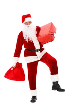 Photo of happy Santa Claus with red giftbox and sack in hands