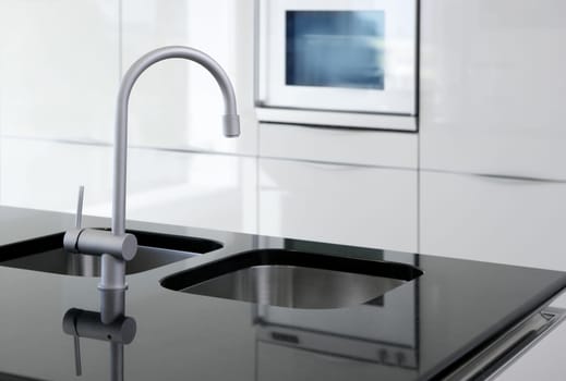 kitchen faucet and oven modern black and white interior design
