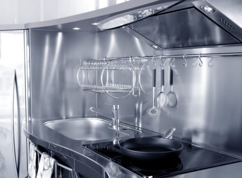 Kitchen silver sink and vitroceramic stove hob modern decoration