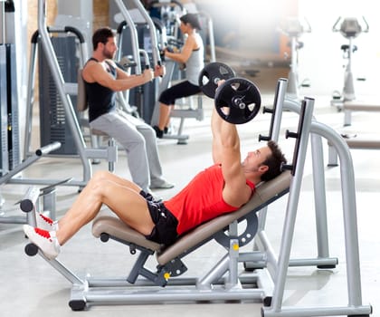 group with weight training equipment on sport gym club