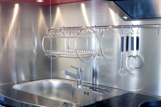 Kitchen silver sink and vitroceramic stove hob modern decoration