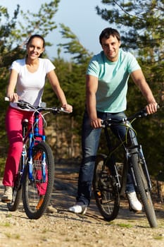 Portrait of an athletic couple on bicycles