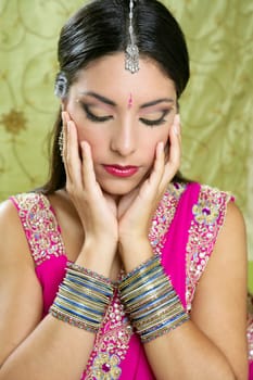 Beautiful indian brunette young woman with traditional fashion