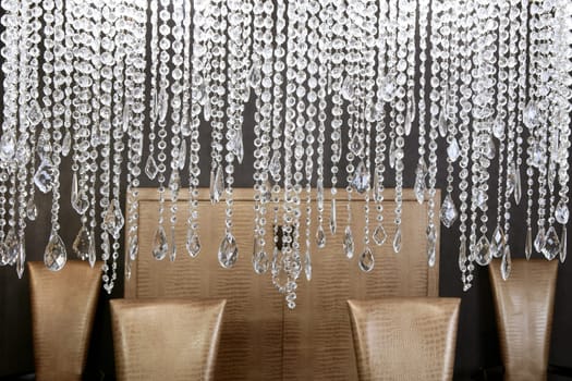 dining room modern crystal strass lamp and crocodile golden chairs