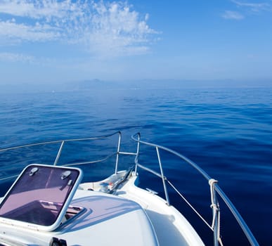 Blue sea boat sailing with open bow porthole in summer vacations