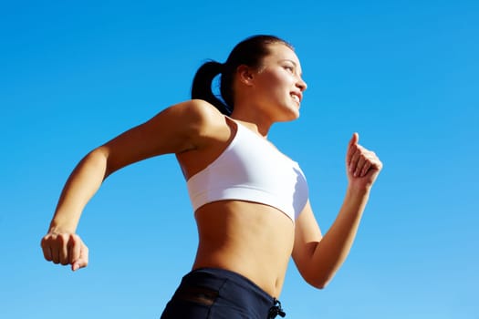 Portrait of a young woman jogging