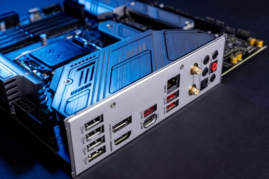 modern powerful and fast motherboard with connectors for HDMI and USB. PC hardware concept. internet cable connection slot