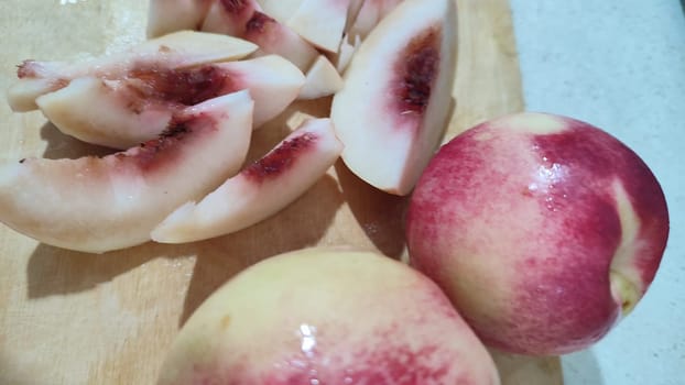 fresh peaches fruit food on kitchen board, dessert. High quality photo