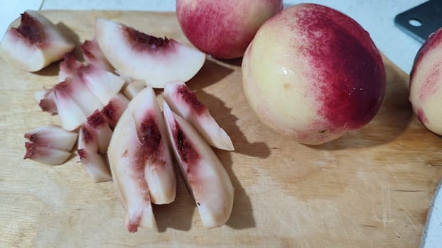 fresh peaches fruit food on kitchen board, dessert. High quality photo