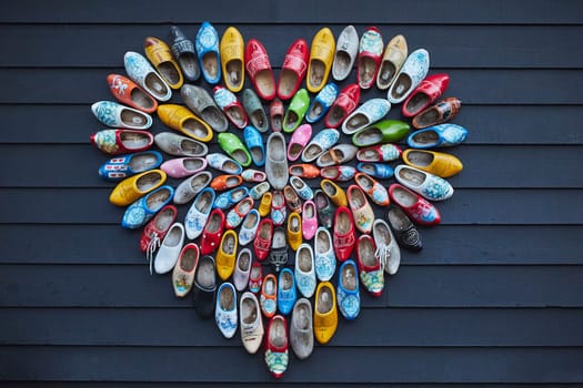 National wooden shoes on the wall of a house in the Netherlands.