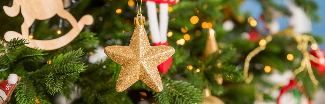 Big christmas tree decorated with beautiful red baubles at home. Copy space.