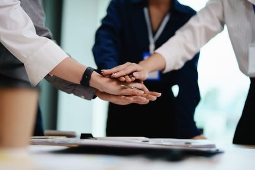 business group people showing unity with their hands together.