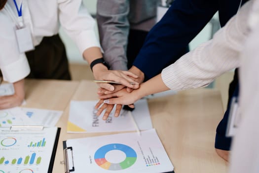 business group people showing unity with their hands together.