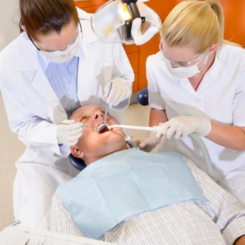 Male patient having dental checkup at surgery stomatology clinic