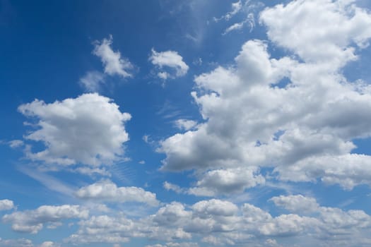 blue sky with cumulus clouds,also suitable as a background