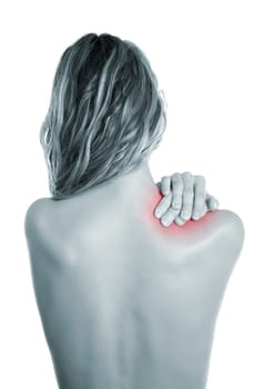 Woman holding her painful shoulder