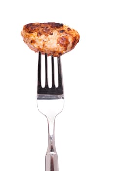 White Isolated Fried Chicken Breast On A Fork