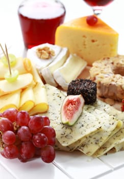 Catering cheese platter with red wine