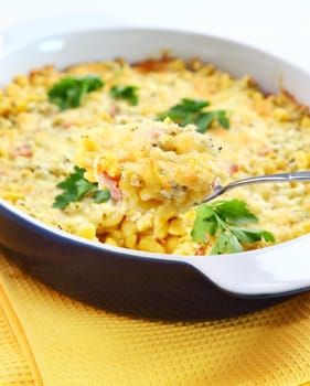 Casserole with pasta and greek cheese with herbs
