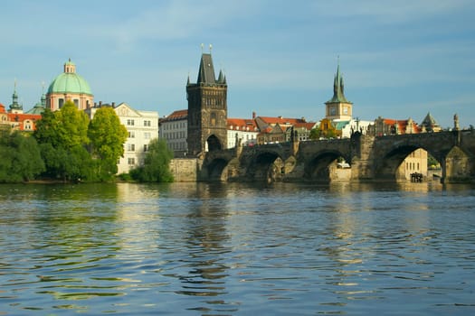 Charles bridge in Prague. The Vltava River in the foreground. (Czech Republic)