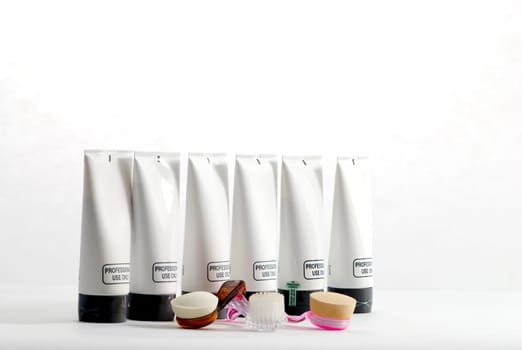 Various professional spa products arranged on a white background