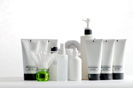 Various professional spa products arranged on a white background