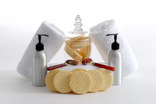 Various professional spa products arranged on a white background