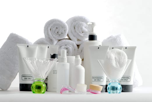 Various professional spa products arranged on a white background