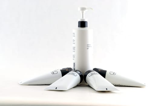 Various professional spa products arranged on a white background