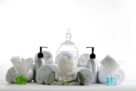 Various professional spa products arranged on a white background