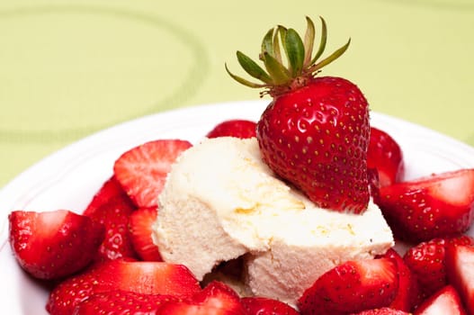 Fresh red strawberries with vanilla ice cream
