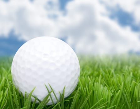 Golf Ball in Grass and Blue Sky