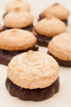 Homemade Coconut Cookies With Chocolate on Wooden Table
