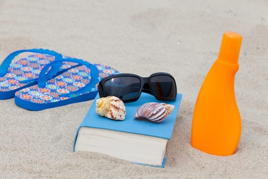 Relaxing on the beach with a book