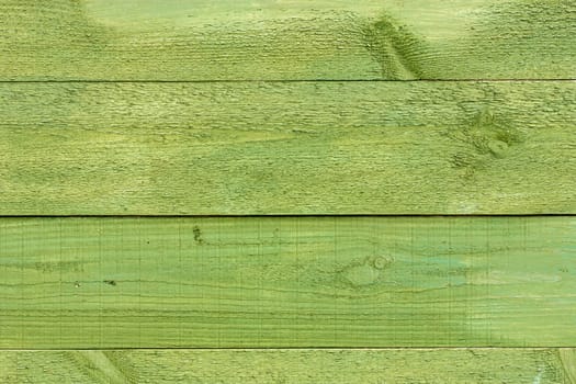 green painted wooden wall. can be used as a background
