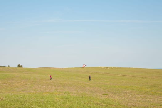 Father and daughter fly kites