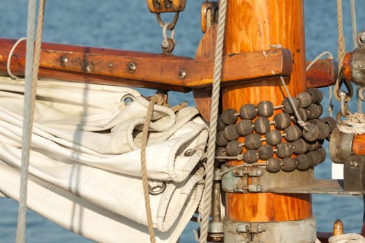 Sail boom fitting on mast with mast slides