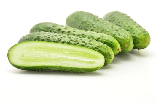 Fresh raw cucumbers isolated on white
