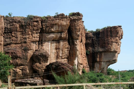 Vertical surface of huge sandstone rocks at Badami, Karnataka, India, Asia