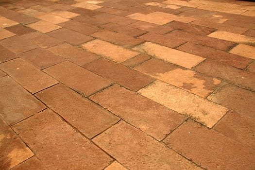 Flooring laid up with neatly dressed stone slabs