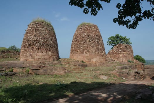 Conical shaped stone watch towers used as observations posts in fort at Badami, Karnataka, India, Asia