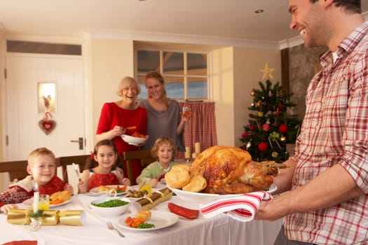 Family having Christmas dinner