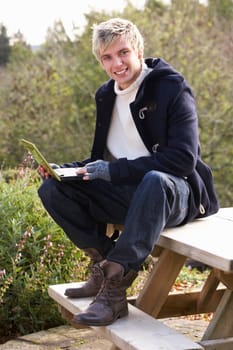Young man with laptop computer