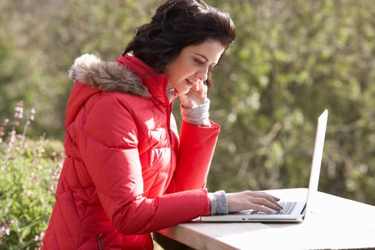 Young woman with laptop computer