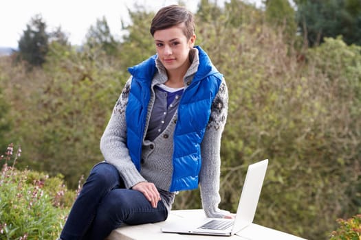 Young woman with laptop computer