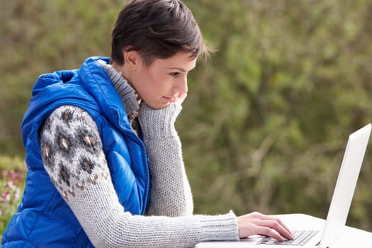 Young woman with laptop computer