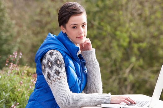 Young woman with laptop computer