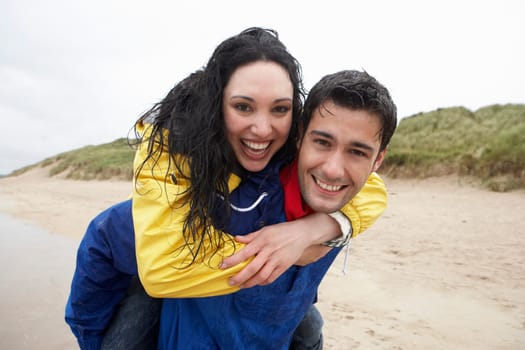 Happy couple on beach in love