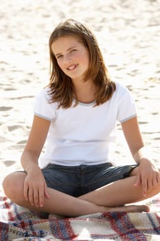 Portrait teenage girl on beach