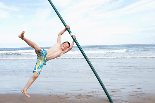 Teenagers playing on beach